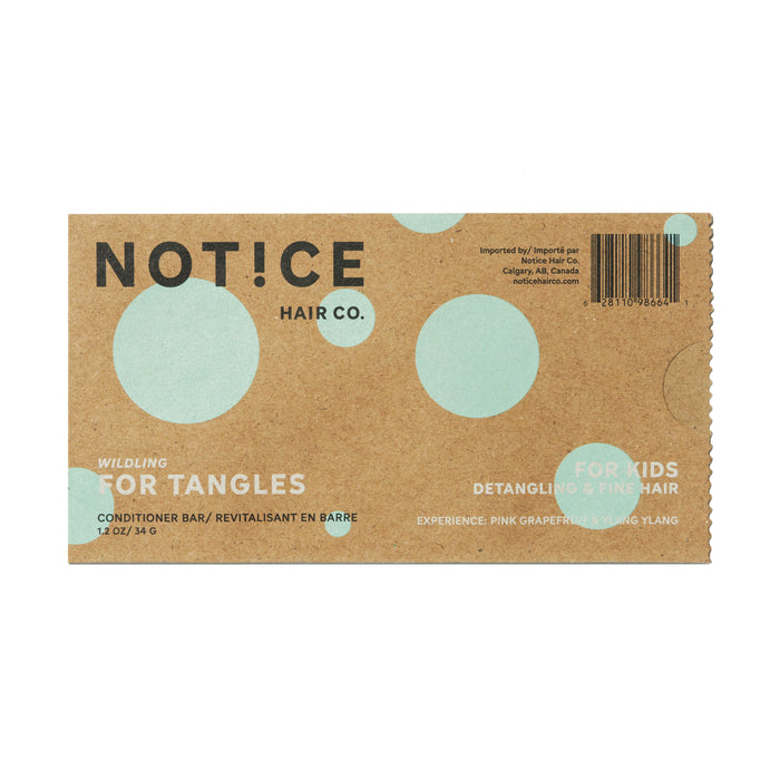 A brown package labeled NOT!CE Hair Co. For Tangles Conditioner Bar contains a kids detangling bar scented with pink grapefruit and ylang-ylang for fine hair. The design has mint green circles, making it a fun addition to any childs hair care routine.