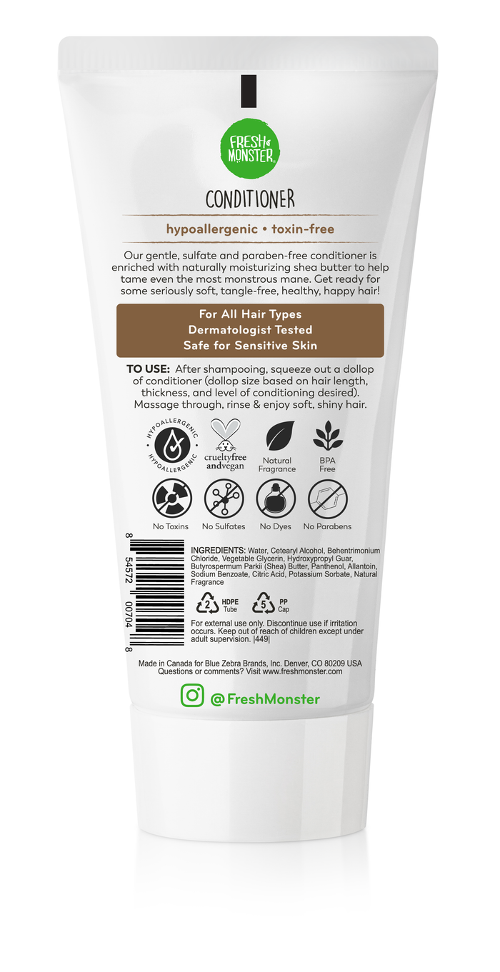 A white tube of Fresh Monster Kids Hair Conditioner for sensitive skin features green labeling. This nontoxic, hypoallergenic conditioner is dermatologist-tested and crafted with coconut oil and shea butter. Its non-GMO, cruelty-free, sulfate-free, and paraben-free.