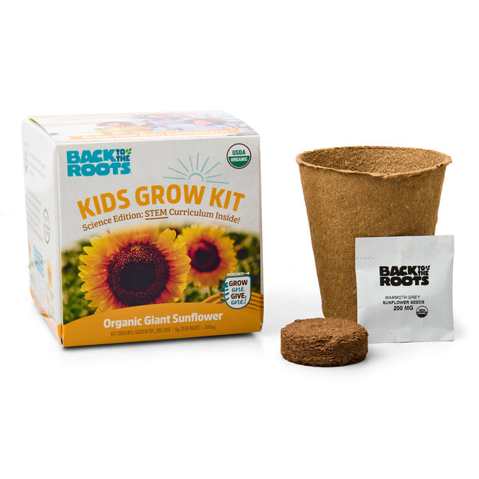 The Kids Sunflower Grow Kit by Back to the Roots includes a box with a sunflower image labeled Organic Giant Sunflower, a biodegradable pot, soil pellet, seed packet, and is USDA Organic certified. It also features the Science Edition: STEM Curriculum Inside for engaging gardening activities.