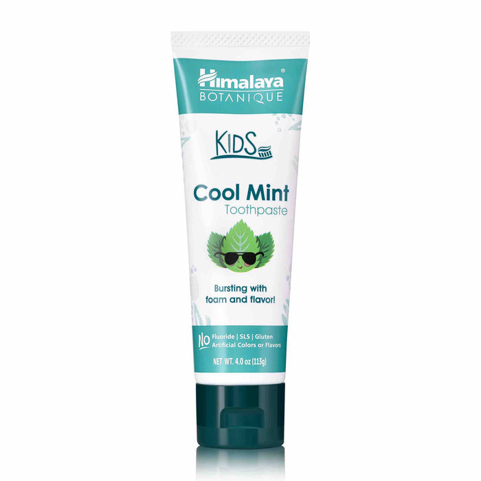 Himalaya Kids Toothpaste combines botanical ingredients with Ayurvedic science. Its white and green packaging, featuring mint leaves with sunglasses, emphasizes its fluoride-free, SLS-free, gluten-free formula without artificial colors or flavors.