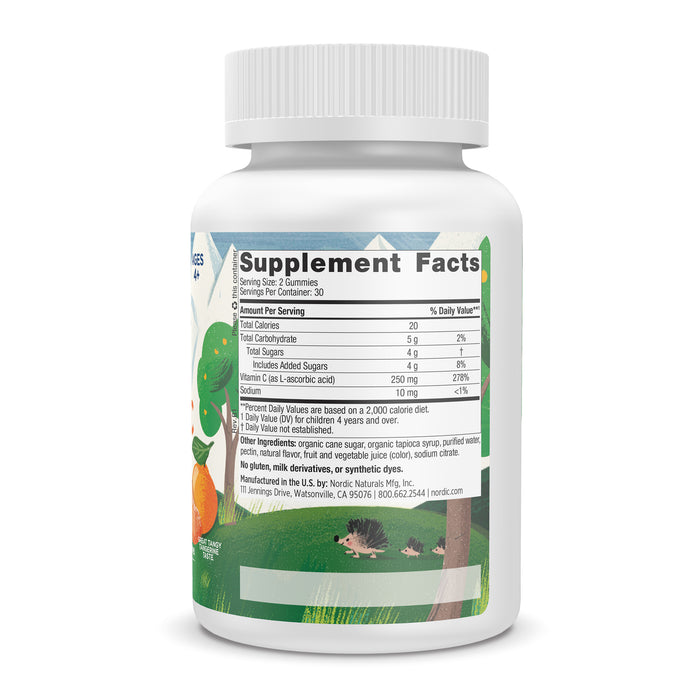 A white bottle labeled Supplement Facts displays nutritional details and illustrations of oranges and leaves. This Nordic Naturals dietary supplement, designed to support immune function, is ideal for those seeking Kids Vitamin C Gummies.
