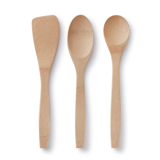 The Bambu Kitchen Basics Set of Bamboo Cooking Utensils features a flat spatula, large spoon, and small spoon made from light FSC-certified bamboo, arranged vertically on a white background.