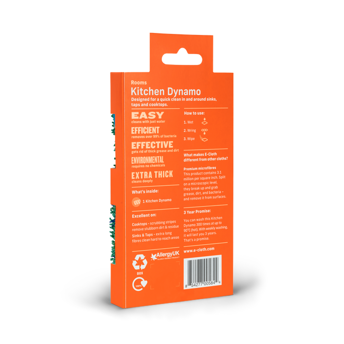 The E-Cloth Kitchen Dynamo Microfiber Scrubber features orange packaging that emphasizes its efficiency and eco-friendly benefits, displaying recycling and allergy certification symbols, with a visible scrubber on the side.