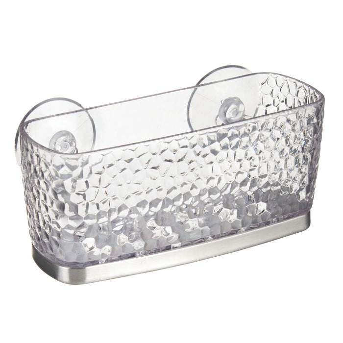 The iDesign Kitchen Sink Sponge Suction, made from recycled plastic, features a textured design with suction cups and a metallic base. Ideal for holding toiletries or small items, it can be mounted on smooth surfaces like bathroom tiles or glass.