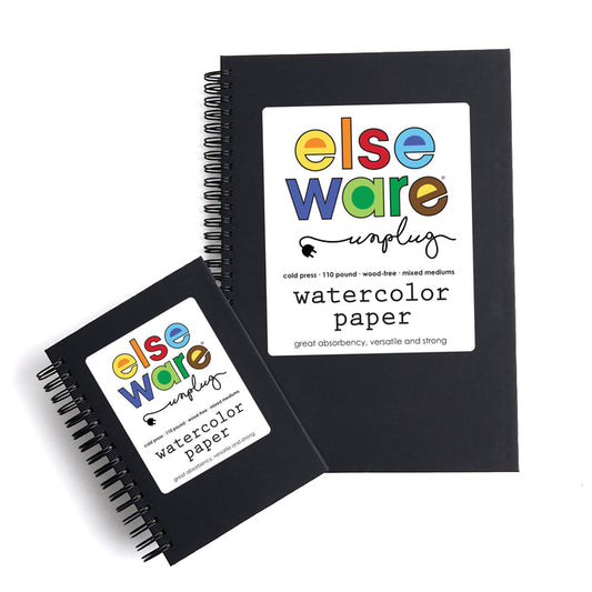 Two black spiral-bound Elseware Unplug Large Watercolor Paper Pads with cold press pages displayed on a white background. Each cover features a colorful logo and product details.