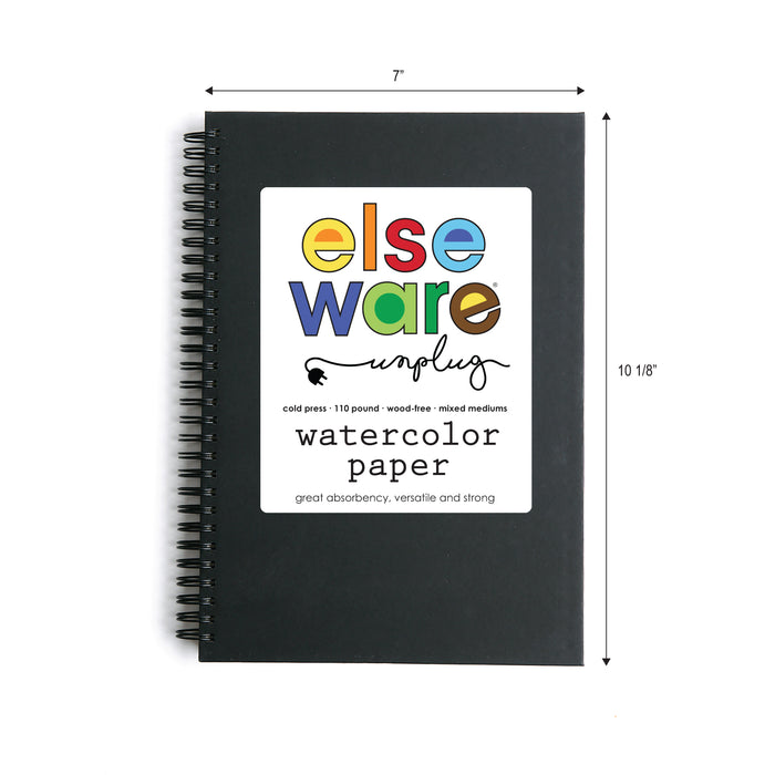 The image shows the Elseware Unplug Large Watercolor Paper Pad, black and spiral-bound with a white label. The pad measures 7 inches wide by 10 1/8 inches tall, as shown by arrows and text.