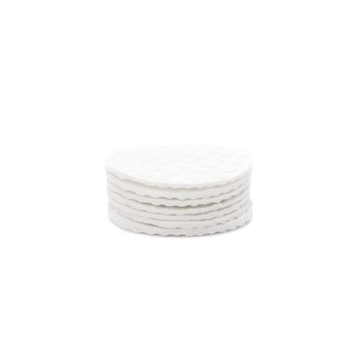 A set of LastRound Refill eco-friendly cotton rounds by LastObject, featuring textured surfaces, neatly stacked against a plain white background.