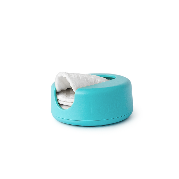 The LastRound by LastObject comes in a turquoise container with a smooth, rounded design that reveals reusable cotton rounds through an opening, offering an eco-friendly option for sustainable beauty practices.