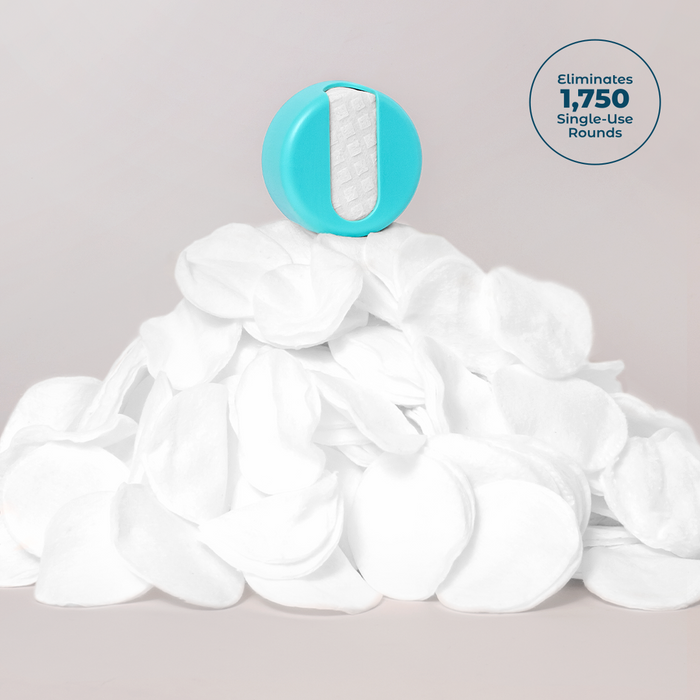 LastRound by LastObject rests on white disposable cotton rounds, boasting Eliminates 1,750 single-use rounds. This turquoise essential with a textured white surface is the ideal sustainable beauty product for an eco-friendly lifestyle.