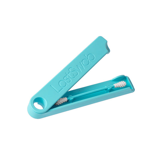 A teal LastSwab Original Reusable Swab by LastObject, featuring eco-friendly silicone tips, is shown in its matching open case. The case is elegantly embossed with LastSwab, highlighting a stylish, sustainable alternative to cotton swabs.