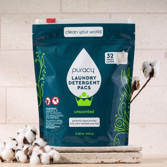 Laundry Detergent Pacs bag with cotton branches, featuring a powerful stain-fighting formula.