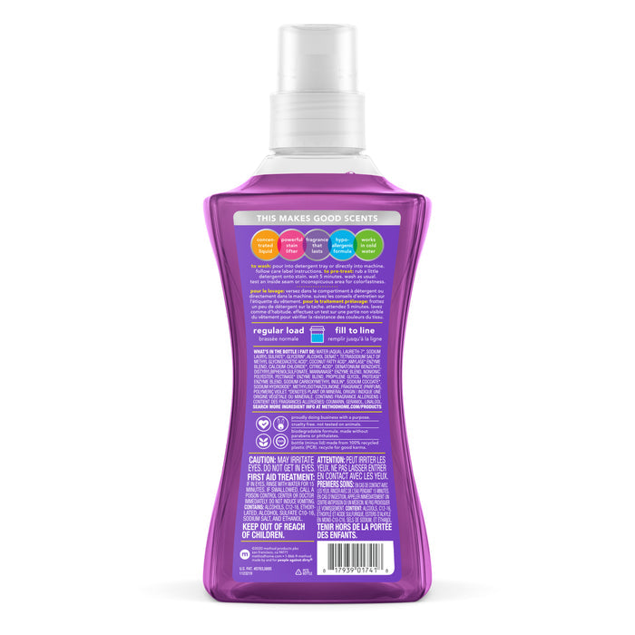 Back view of the methods Laundry Detergent Pour in purple with a white cap, featuring colorful text bubbles and usage instructions. White and purple cautionary labels highlight that its paraben-free for gentle care.