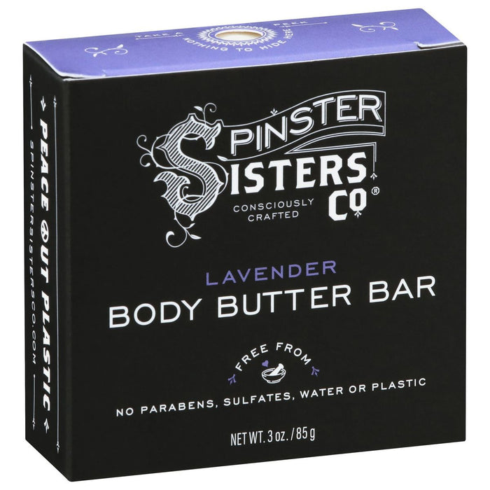 The black box features Spinster Sisters Co. branding in white, highlighting the paraben, sulfate, water, and plastic-free formula of the 3 oz Lavender Body Butter Bar with lavender essential oil and Fair Trade shea butter for a nourishing experience.