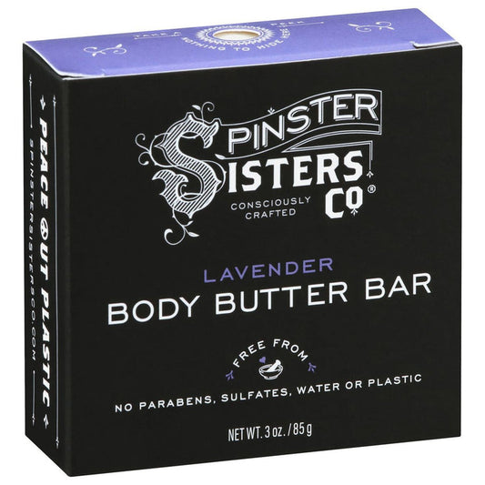 The black box features Spinster Sisters Co. branding in white, highlighting the paraben, sulfate, water, and plastic-free formula of the 3 oz Lavender Body Butter Bar with lavender essential oil and Fair Trade shea butter for a nourishing experience.