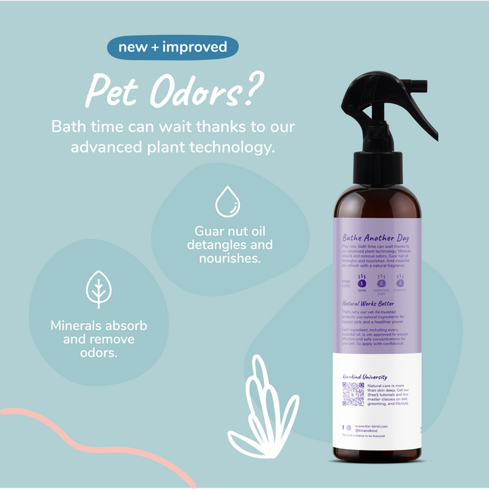 A spray bottle labeled Lavender Natural Coat Spray for Dog & Cat by kin+kind is featured, emphasizing natural pet products and pet odor removal with plant technology. The text showcases guar nut oil for detangling and minerals that absorb odors, set against a blue background with leaves and a wavy line.