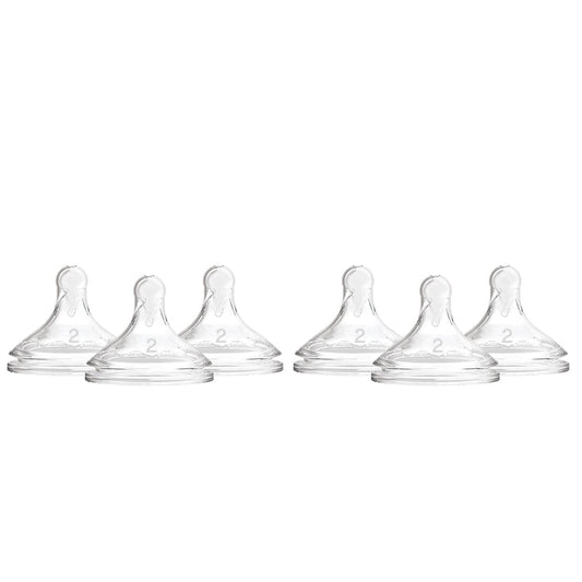 The image displays six Dr. Browns Level 2 Flow Silicone Wide-Neck Nipples, arranged in two rows. Made from 100% silicone, each nipple is designed for medium flow and features an anti-colic vent system, all against a white background.