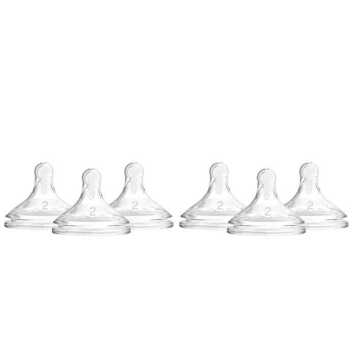 Seven Dr. Browns Level 2 Flow Silicone Wide-Neck Nipples, made from 100% silicone, are displayed in two rows on a white background. Each conical nipple includes an anti-colic vent system and has a small 2 printed on the side for medium flow comfort.