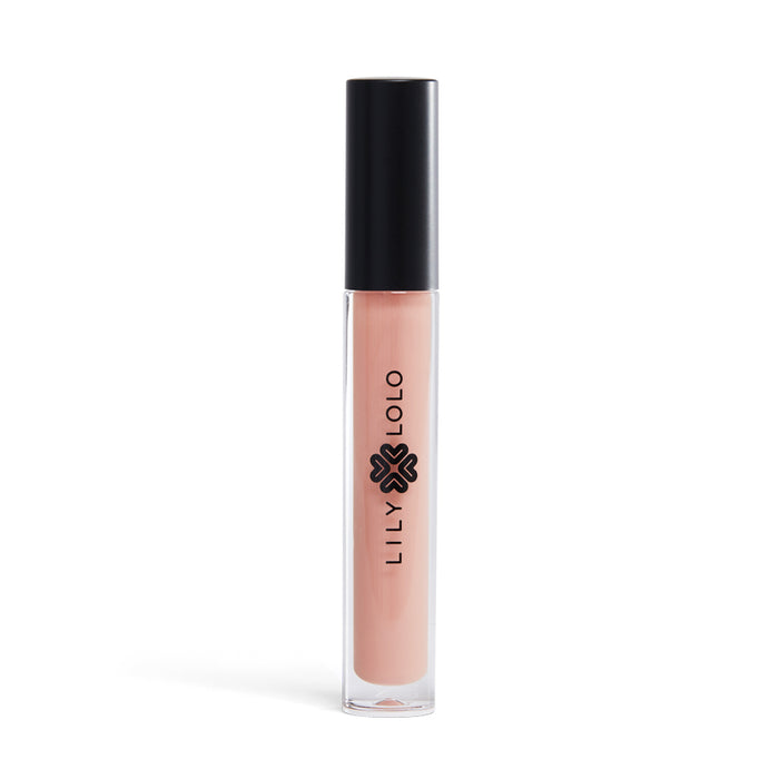 This paraben-free Lily Lolo Lip Gloss is packaged in a clear tube with a black cap, showcasing a pink glossy liquid. Lily Lolo and its stylized logo are elegantly printed vertically on the front against a simple white backdrop.