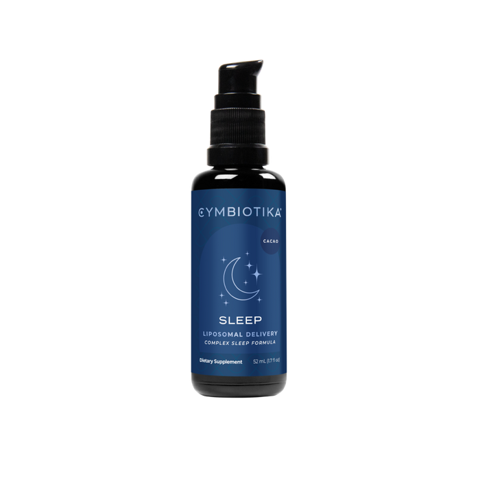 A blue bottle of Cymbiotika’s Liposomal Sleep, featuring a black pump, crescent moon, and stars on the label, sits against a white background. The 52 ml cacao-flavored formula promises deep restful sleep, perfect for embracing rest and relaxation.