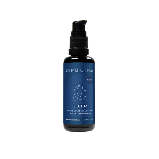 A blue bottle of Cymbiotika’s Liposomal Sleep, featuring a black pump, crescent moon, and stars on the label, sits against a white background. The 52 ml cacao-flavored formula promises deep restful sleep, perfect for embracing rest and relaxation.