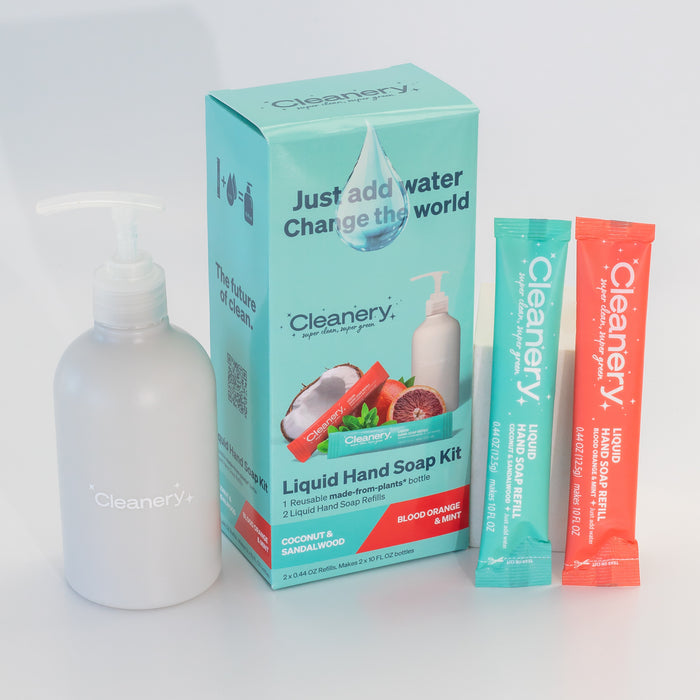 The Cleanery Liquid Hand Soap Starter Kit includes a reusable pump bottle ideal for sensitive skin, with two scent refills: blood orange & mint and coconut & sandalwood. The refills are neatly packaged beside the box featuring a coconut & sandalwood fragrance.