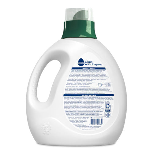 A white plastic Seventh Generation Liquid Laundry Detergent bottle with a green cap, shown from the back to display the label with product info, directions, and recycling symbols. Made with natural ingredients and Certified B Corporation standards.