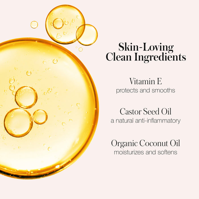 Golden oil droplets on a light background highlight RMS Beauty’s Champagne Rosé Luminizer, featuring skin-loving ingredients like Vitamin E, Castor Seed Oil, and Organic Coconut Oil for a healthy glow and radiant finish.