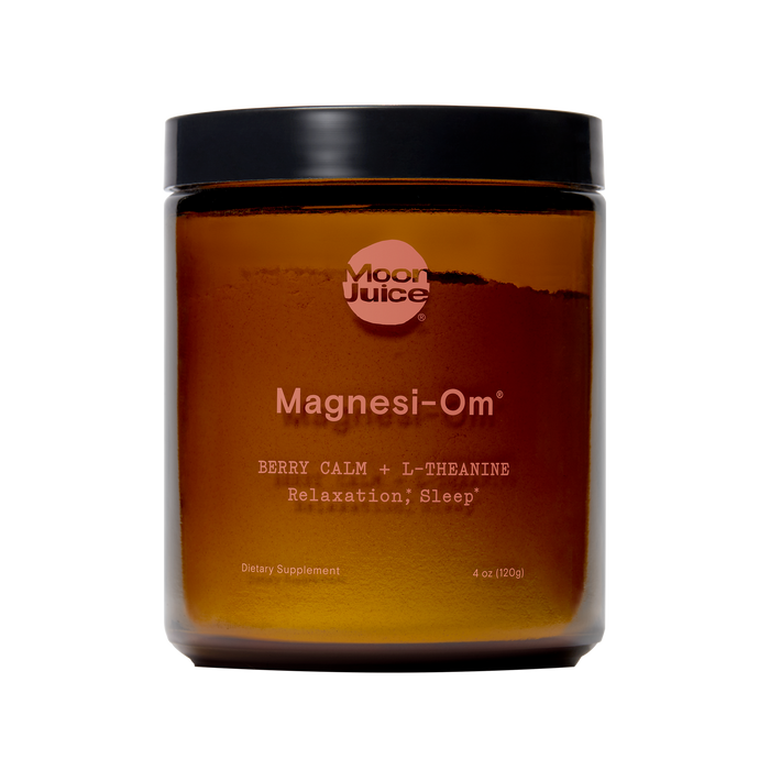 A Moon Juice product, Magnesi-Om, is a brown glass jar with a black lid. It contains 4 oz (120 g) of magnesium supplement labeled for relaxation, brain health, and sleep with Berry Calm + L-Theanine.