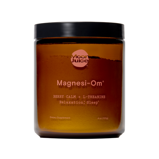 A Moon Juice product, Magnesi-Om, is a brown glass jar with a black lid. It contains 4 oz (120 g) of magnesium supplement labeled for relaxation, brain health, and sleep with Berry Calm + L-Theanine.