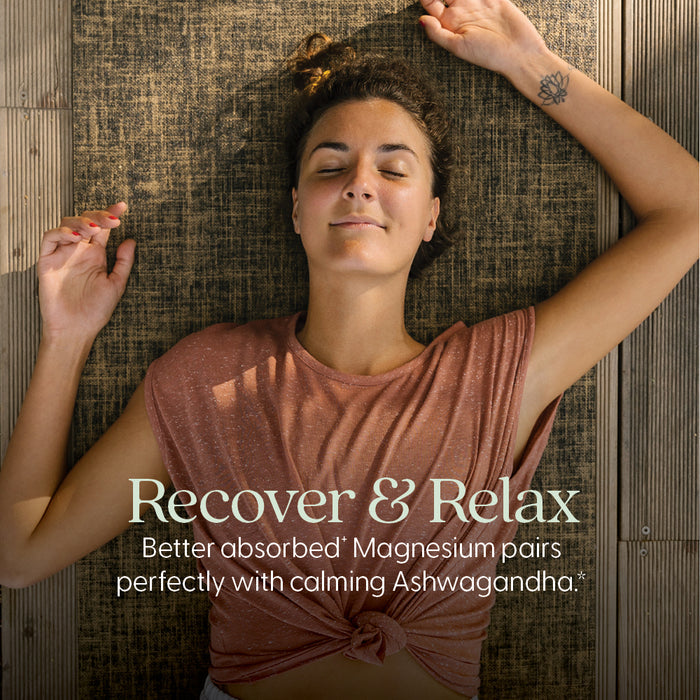 A woman relaxes on her back, eyes closed, in a brown shirt. Text: “Recover & Relax with New Chapter Magnesium + Ashwagandha for muscle, bone, heart, and relaxation support.”.