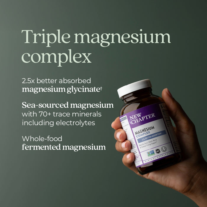 A hand holding a bottle of New Chapter Magnesium, set against a dark green background. The packaging highlights features like "Triple magnesium complex," "2.5x better absorbed magnesium glycinate," "Sea-sourced magnesium," and "Whole-food fermented magnesium.