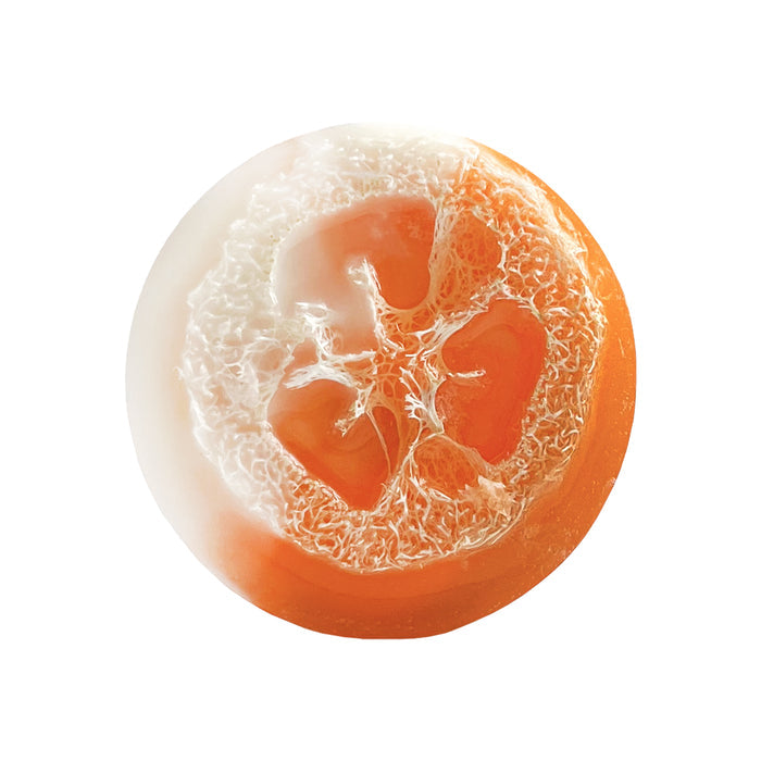 Close-up of Soapymanias Mango Coconut Loofah, featuring a handmade two-toned soap bar with white and orange sides, highlighting the intricate loofah texture inside.