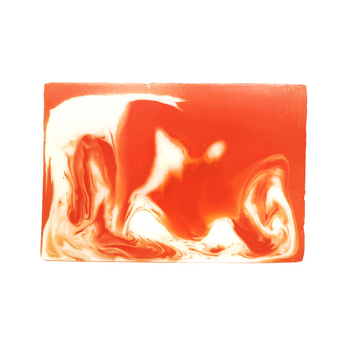 The Mango Coconut Soap Bar by Soapymania is a handmade, rectangular bar with a marbled design featuring bright orange and white swirls.