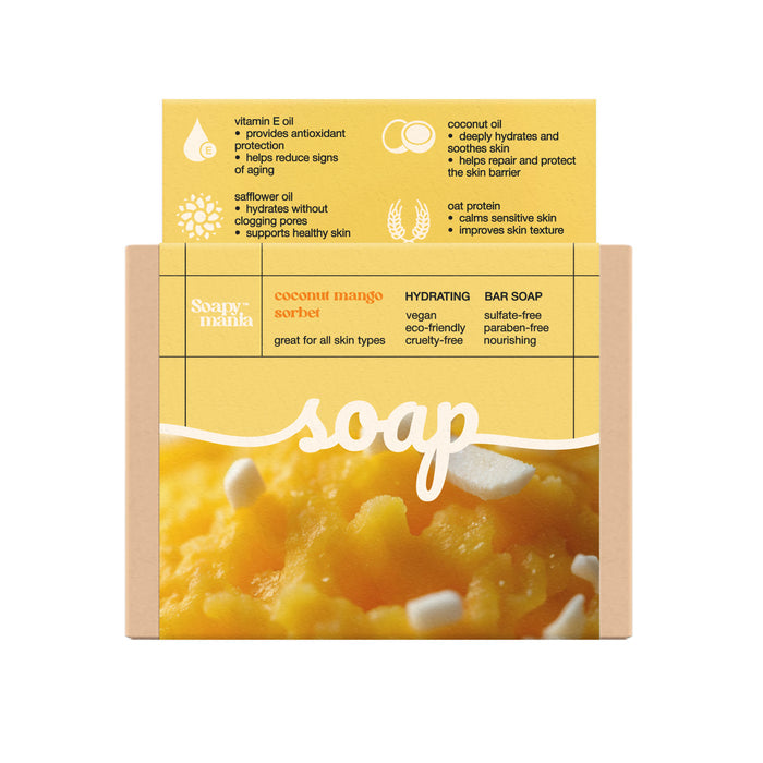 A box of Soapymania Mango Coconut Sorbet Hydrating Bar Soap, labeled plastic-free, vegan, eco-friendly, cruelty-free, sulfate- and paraben-free, nourishing; yellow top flap features benefits and ingredient icons.