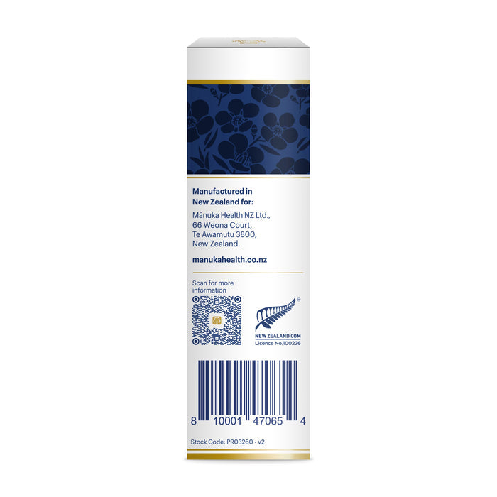 The product box for the Manuka Honey and Propolis Throat Spray by Manuka Health displays Mānuka Health NZ Ltd. with contact details, website, barcode, QR code, and New Zealand license number. Its design features a blue pattern with light floral elements to emphasize its Manuka Honey heritage.