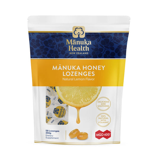 A vibrant yellow and white pack from Manuka Health, these Manuka Honey Lozenges feature a lemon slice, lozenges, and the text 58 lozenges and MGO 400+ on the front. They are natural lemon flavored and enriched with Vitamin C.