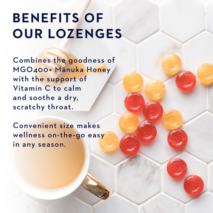 A flat lay image shows a cup and several orange and red lozenges on a hexagonal white tile surface. Text highlights the benefits of lozenges with MGO400+ Mānuka Honey and Vitamin C for soothing dry throats, emphasizing convenience and wellness.