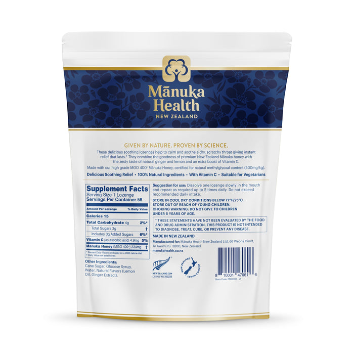 The back of a Manuka Health Manuka Honey Lozenges package shows supplement facts, ingredients, and usage instructions on a white background with a navy-blue header featuring the brands name and logo.