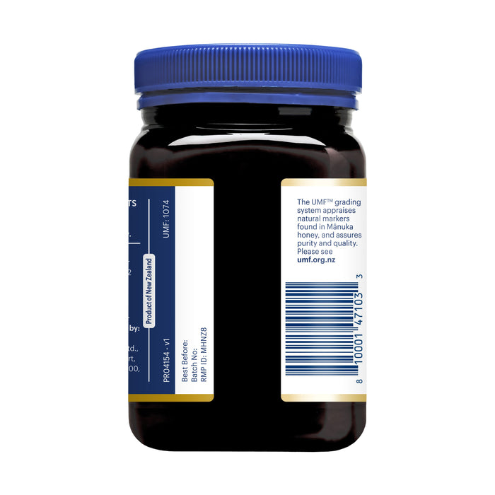 A jar of Manuka Health Manuka Honey MGO 700+ / UMF 18+ has a blue lid and showcases its UMF 18+ grade, authentication label, clearly displaying the barcode and product information.