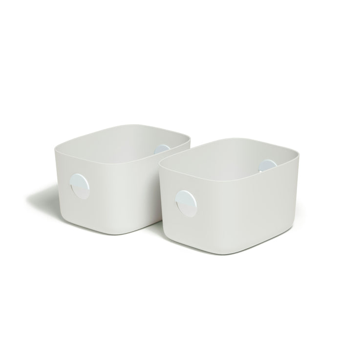 Two Open Spaces Medium Storage Bins, light gray and rectangular with rounded corners and circular handles, ideal for multi-purpose shelf or pantry storage, placed against a white background.