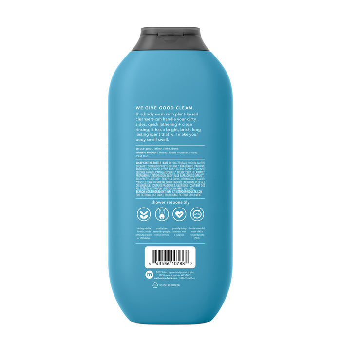 A blue bottle of method Mens Body Wash features white text on the back, presenting product details, safety icons, and a barcode at the bottom. The text emphasizes naturally derived soaps with plant-based ingredients and eco-friendly practices.