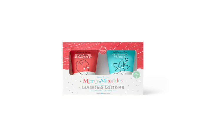 Introducing Dabble & Dollops Merry Mixables Layering Lotions, a natural holiday gift set with two custom scents: Hydrating Strawberry and Hydrating Vanilla. The red and white packaging is adorned with line drawings of strawberries and a vanilla flower.