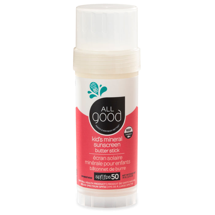 A vertical tube of All Good Mineral Kids Sun Butter Stick with SPF 50, featuring white and red packaging. The label includes a logo and text in English and French. Made with organic ingredients, it has an off-white cap atop the vibrant red bottom half.