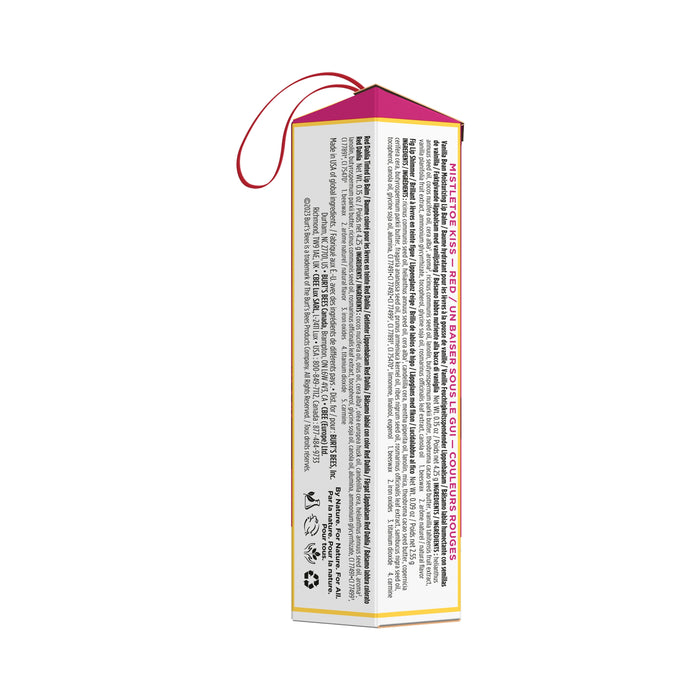 The Mistletoe Kiss Gift by Burts Bees comes in a tall, hexagonal cardboard box with a pink top and red cord. It includes multilingual text in English and French, along with recyclability symbols and barcodes, perfect for holding your favorite lip shimmer.