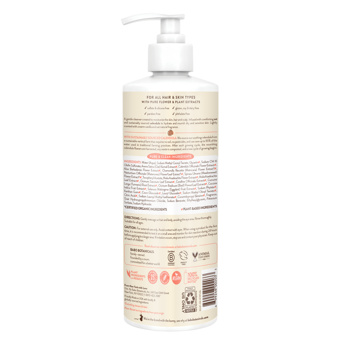 Introducing Babo Botanicals Moisturizing Shampoo & Wash, a hair and skin care solution with a convenient pump. Its beige packaging includes detailed ingredients and sustainability symbols, epitomizing eco-friendly beauty—ideal for those desiring a natural cleansing experience.