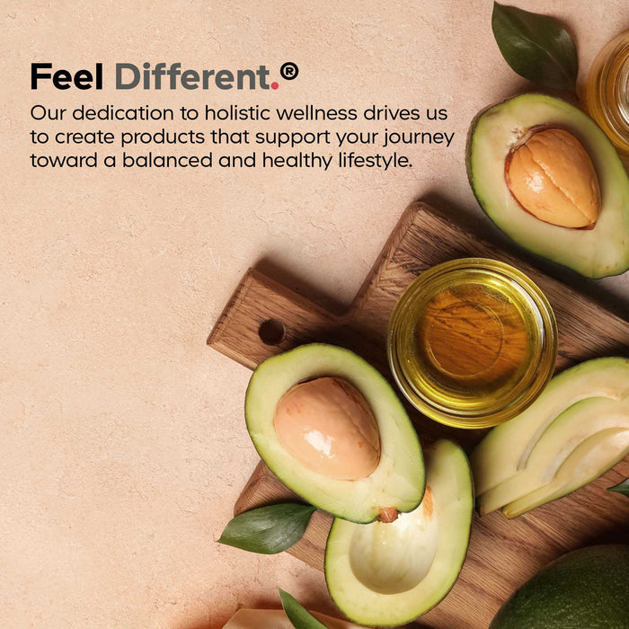 A wooden cutting board with halved avocados, avocado leaves, and small bowls of oil sits on a beige surface beside text about Codeage's Amen Vitamin D, K2 & Zinc—supporting a balanced, healthy lifestyle.