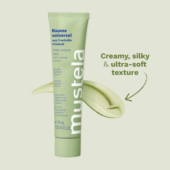 A light green tube of Mustela Baume Universel multi-purpose balm is displayed. The tube features text about avocado extracts and benefits. A dollop of the balm is shown next to the tube with descriptive text "Creamy, silky & ultra-soft texture" beside it.