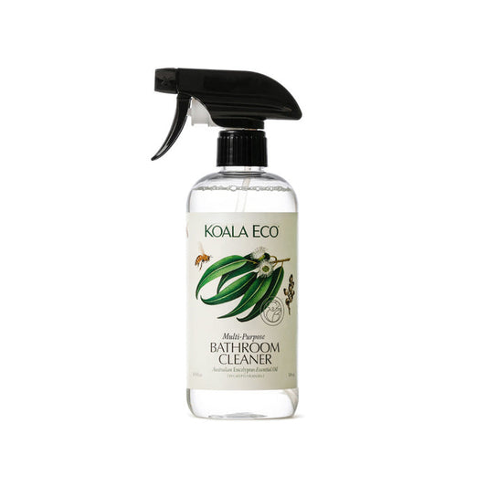 A clear spray bottle labeled Koala Eco Multi-Purpose Bathroom Cleaner with a black trigger nozzle and an illustrated eucalyptus branch, designed to effectively remove soap scum.