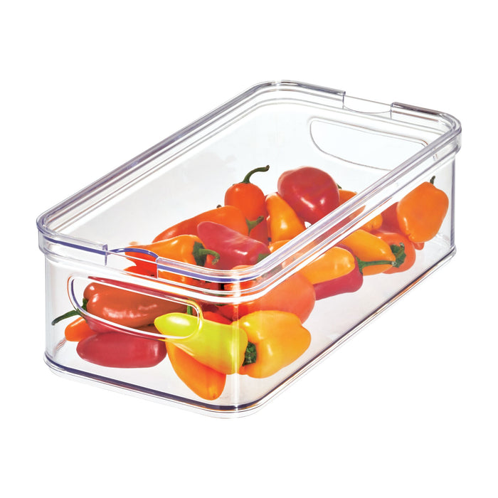 The iDesign Multi-Purpose Divided Bin, crafted from recycled plastic, neatly holds vibrant red, orange, and yellow sweet peppers. With integrated handles on each side, this BPA-free container is perfect for organizing your refrigerator.