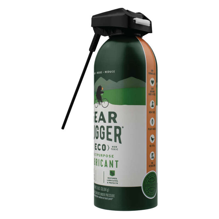 Gear Huggers Multi-Purpose Lubricant features a black nozzle and straw for easy application. The design displays a cyclist in a green landscape, highlighting eco-friendly symbols and text that emphasize its non-toxic qualities and excellent rust protection.